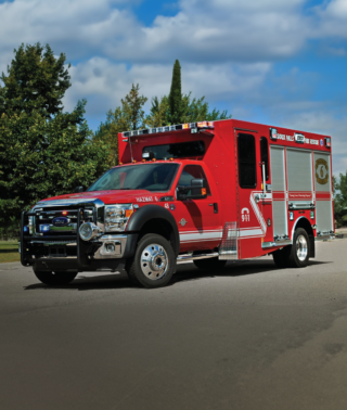 A red emergency response vehicle showcasing Wynne sliding windows.